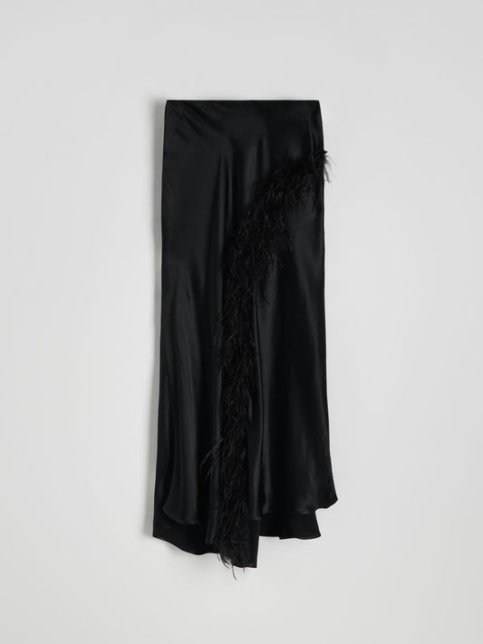 Asymmetric skirt with decorative faux feathers