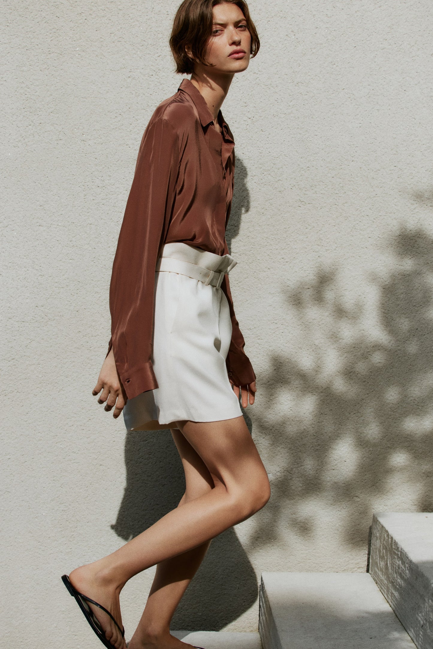 Cream Belted viscose-blend shorts