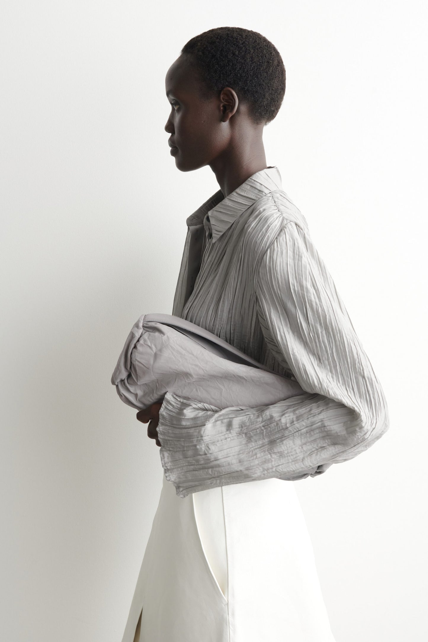 Mini Textured-Leather Cylinder Clutch Bag