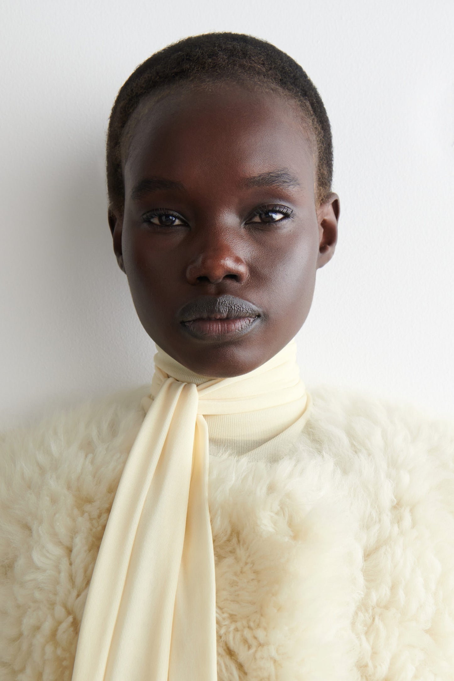 Collarless Shearling Coat