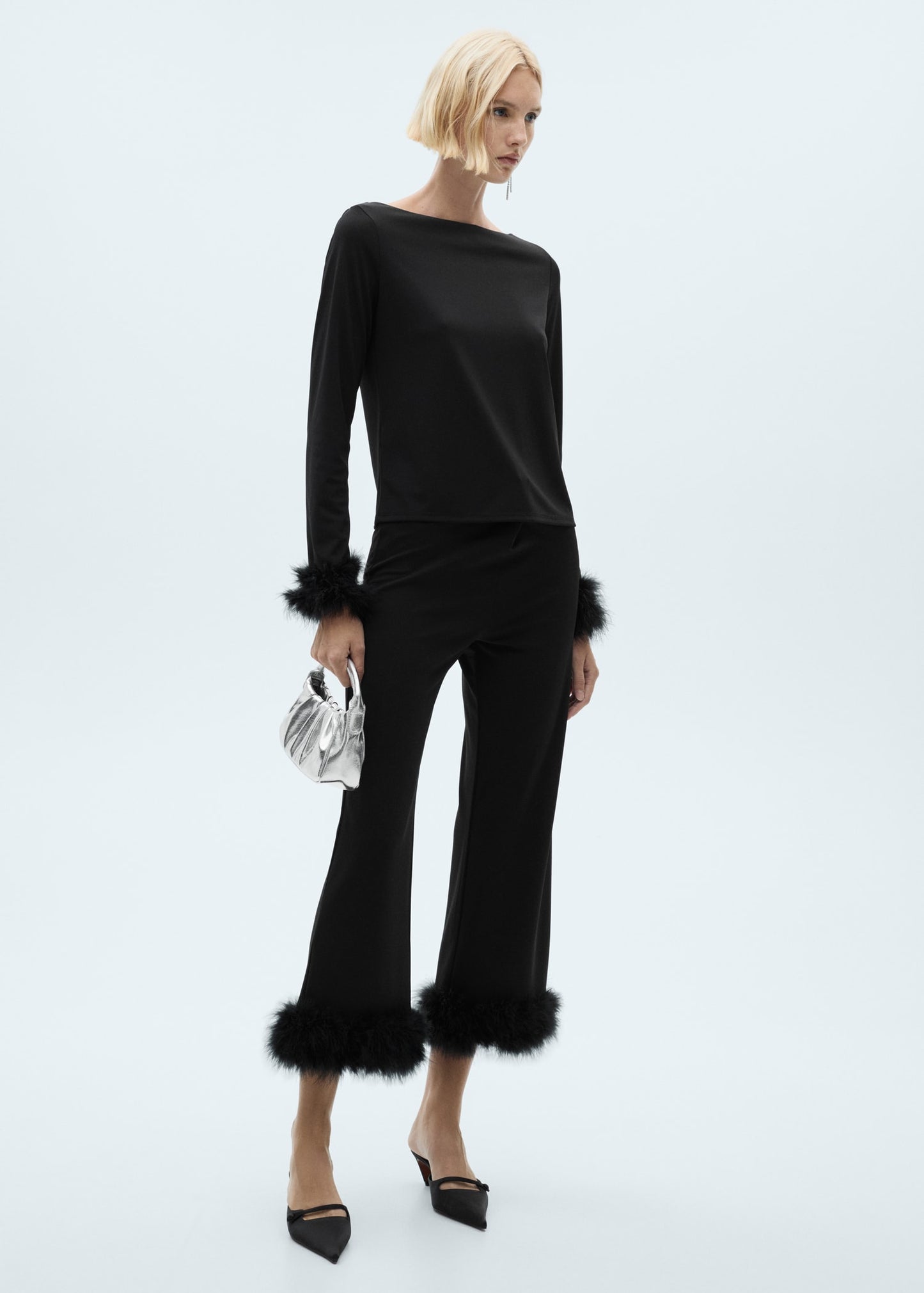 Cropped trousers with feather detail