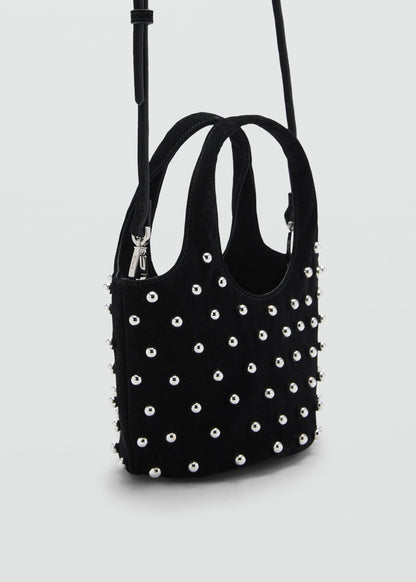 Handbag with decorative studs