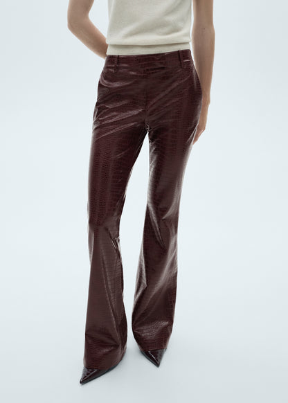 Snake-effect flared trousers