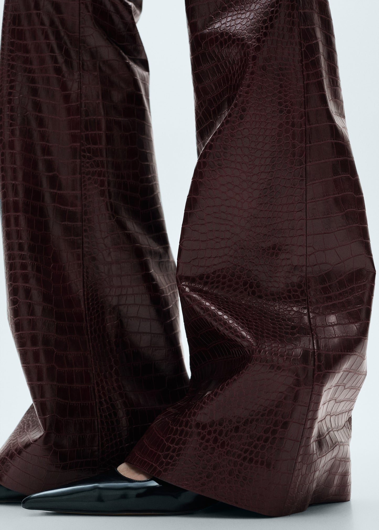 Snake-effect flared trousers