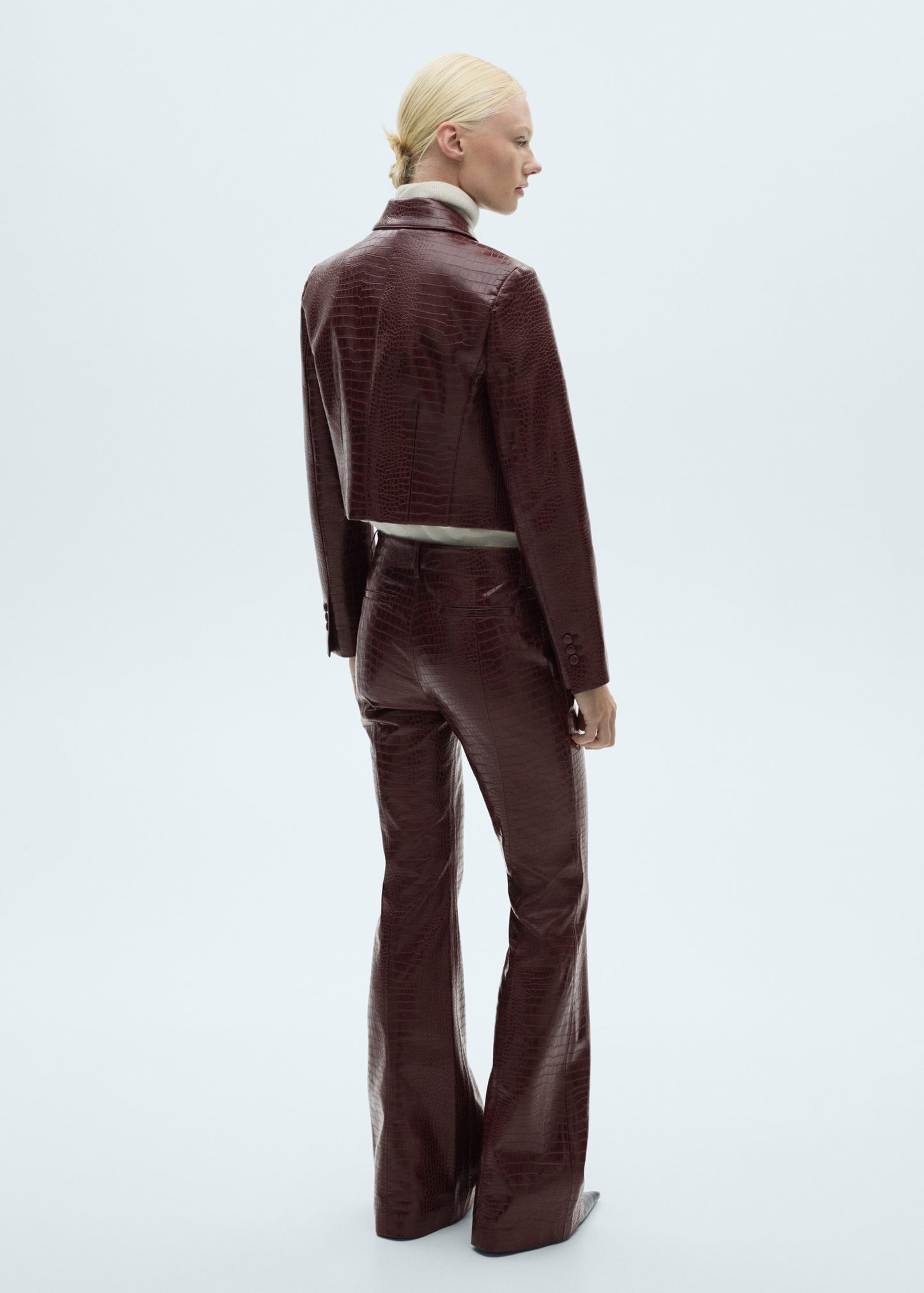 Snake-effect flared trousers