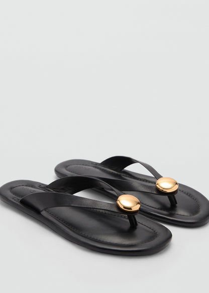 Leather sandals with adornment