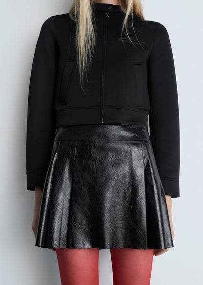 Leather-effect pleated mini-skirt