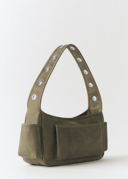 Leather bag with studs and pockets