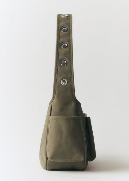 Leather bag with studs and pockets