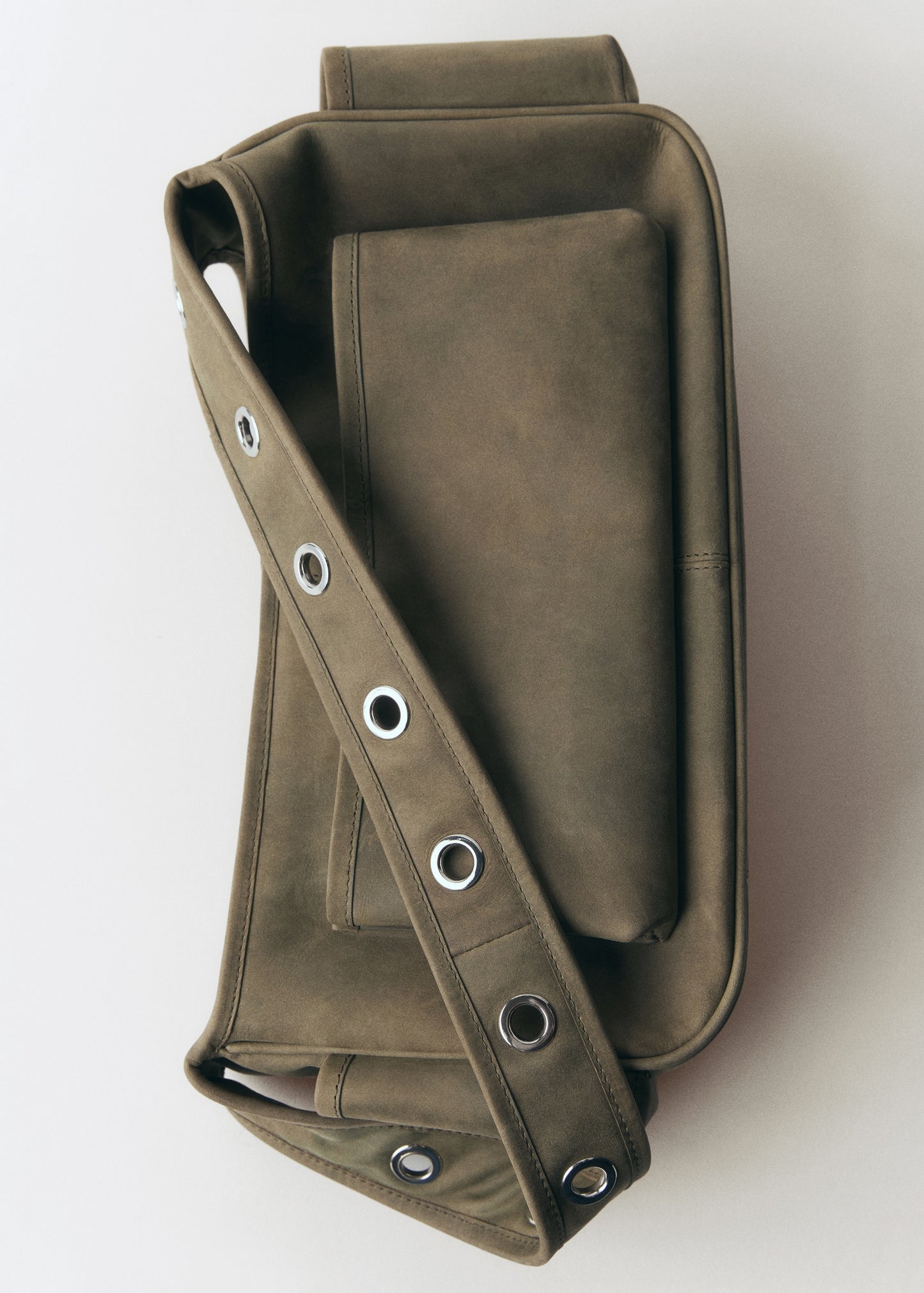 Leather bag with studs and pockets