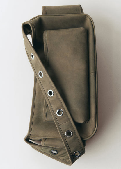 Leather bag with studs and pockets