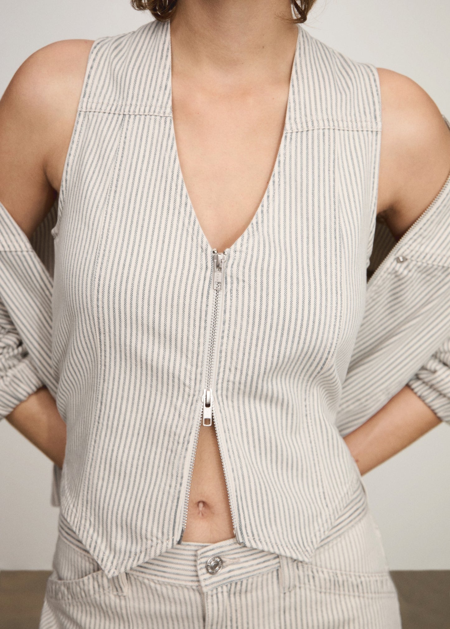 Striped gilet with zip