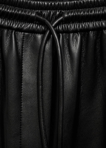 Leather-effect elastic waist trousers