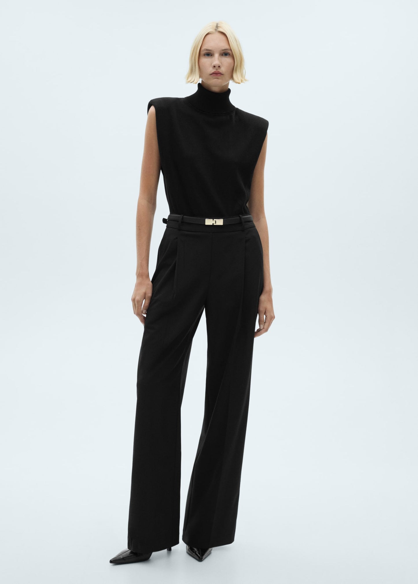 Shoulder padded jumpsuit with belt