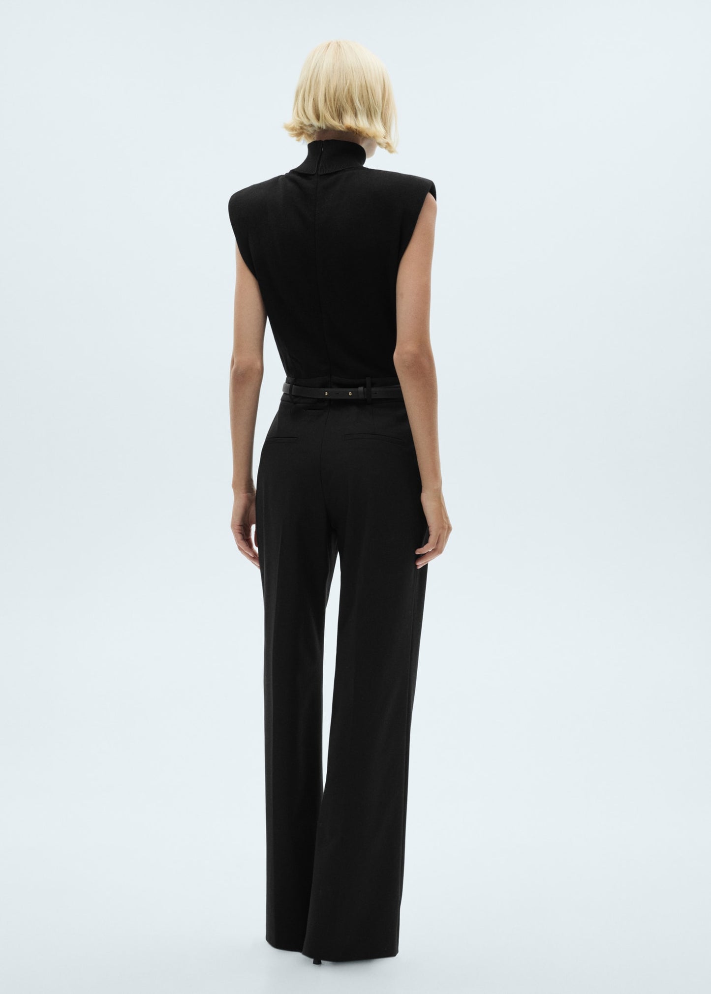 Shoulder padded jumpsuit with belt