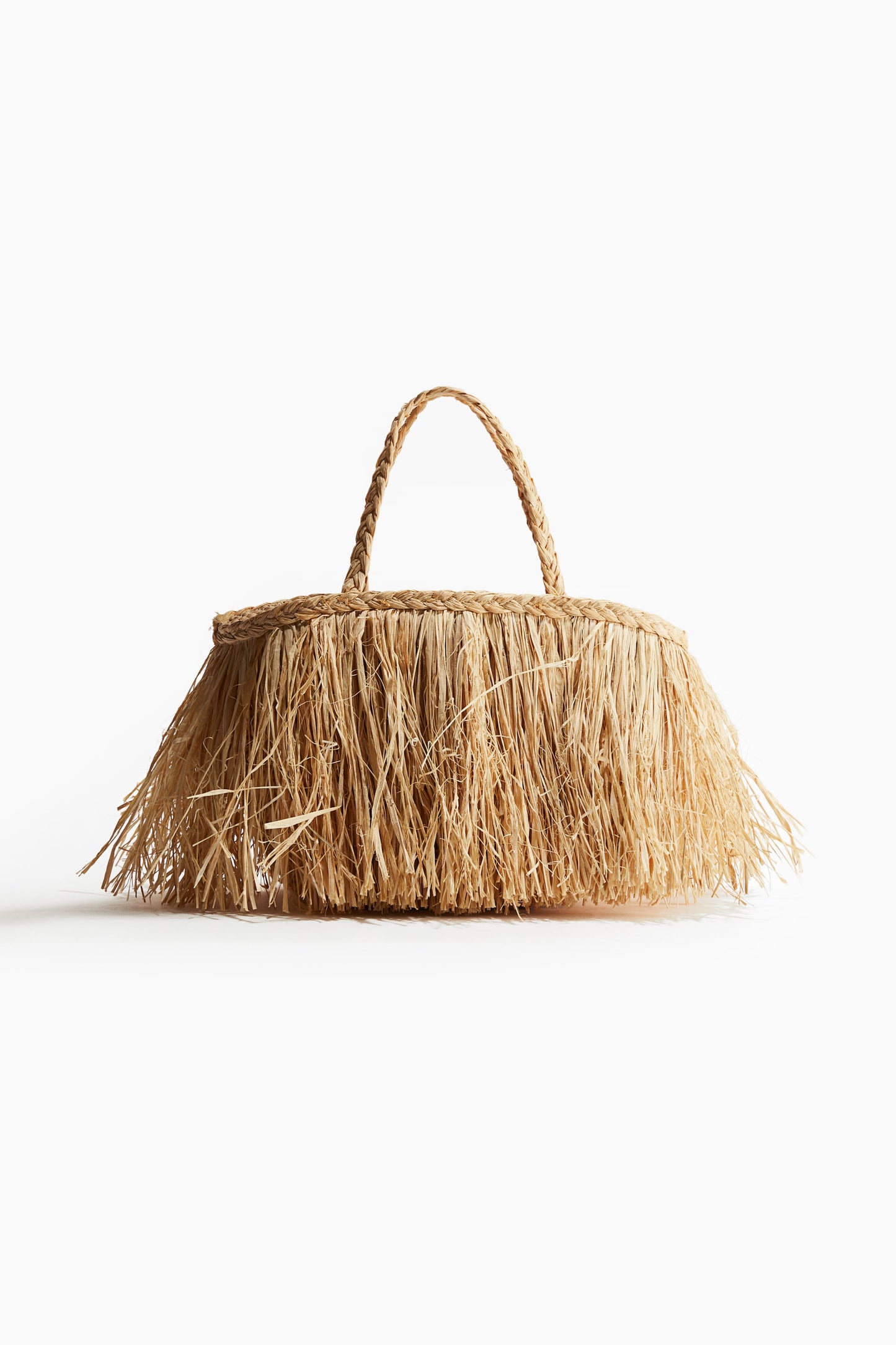 Fringed straw bag