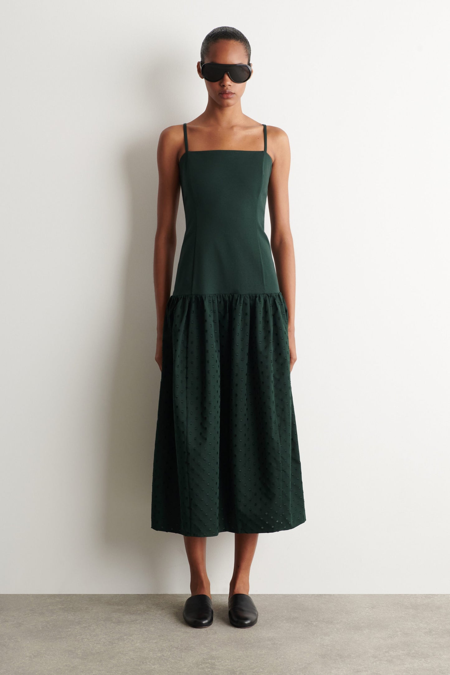 Polka-dot sculpted dropped-waist dress