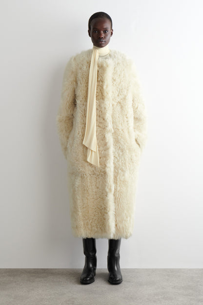 Collarless Shearling Coat