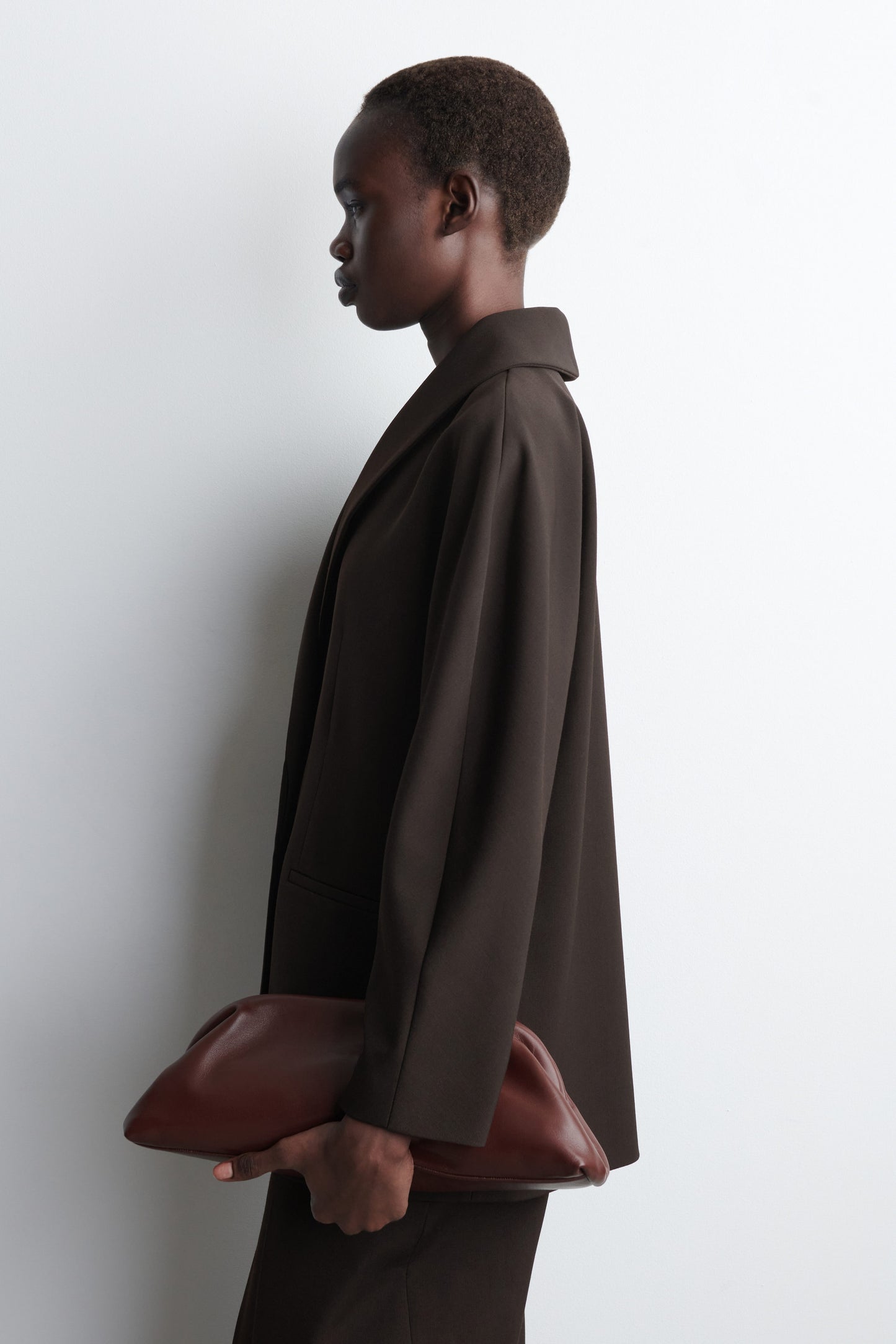 Ingot leather clutch bag