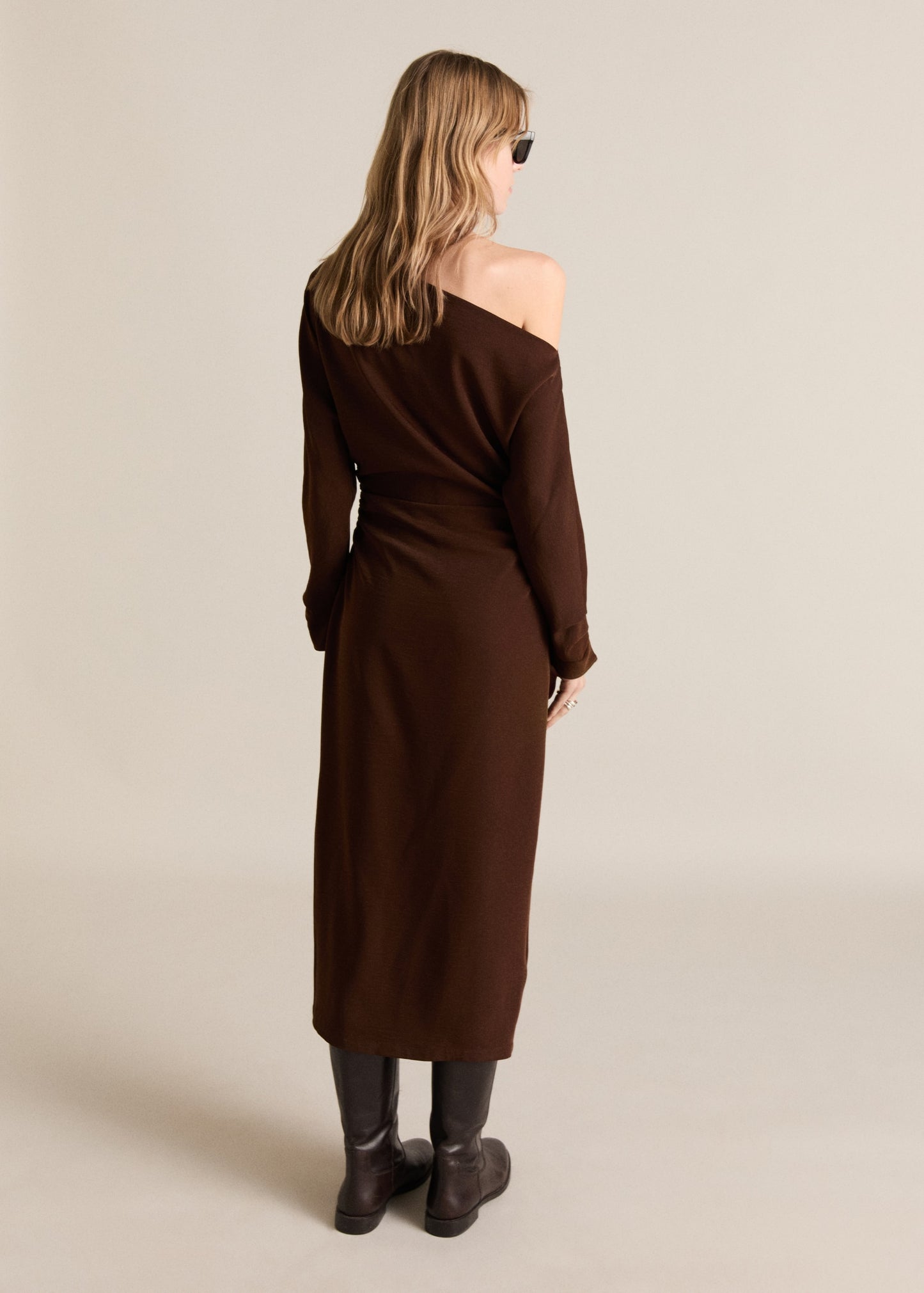 Asymmetrical dress with gathered sides