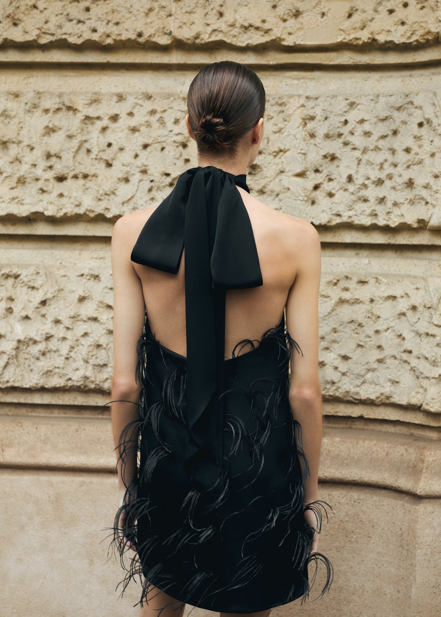 Halter dress with feather decoration