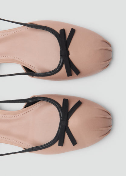 Ballet flats with decorative bow tie