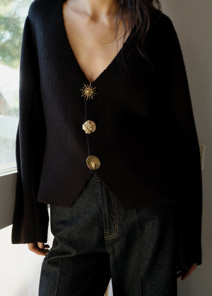 Knitted jacket with jewel buttons
