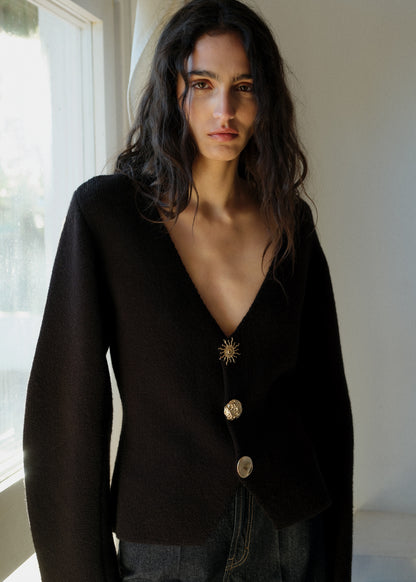 Knitted jacket with jewel buttons