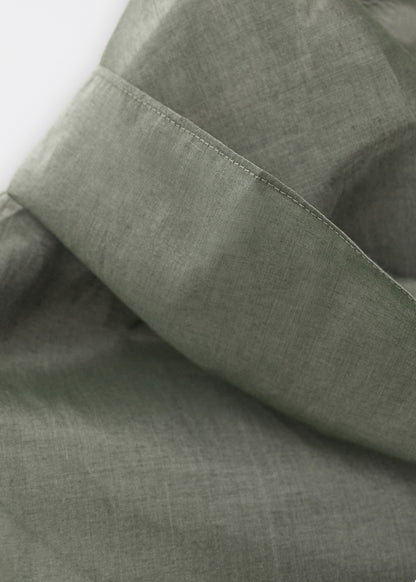 Silk blouse with asymmetrical neckline