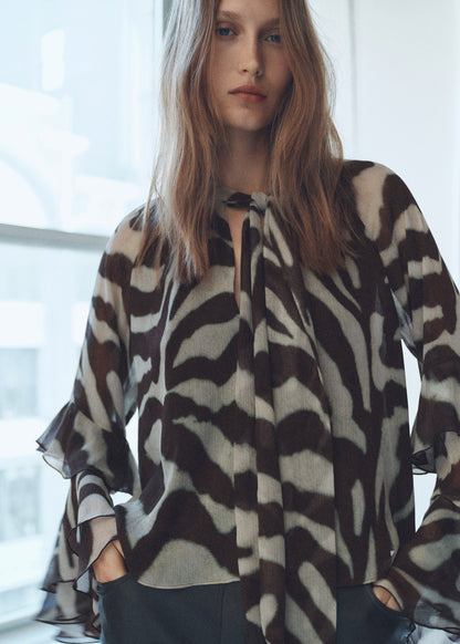 Printed blouse with flared sleeves
