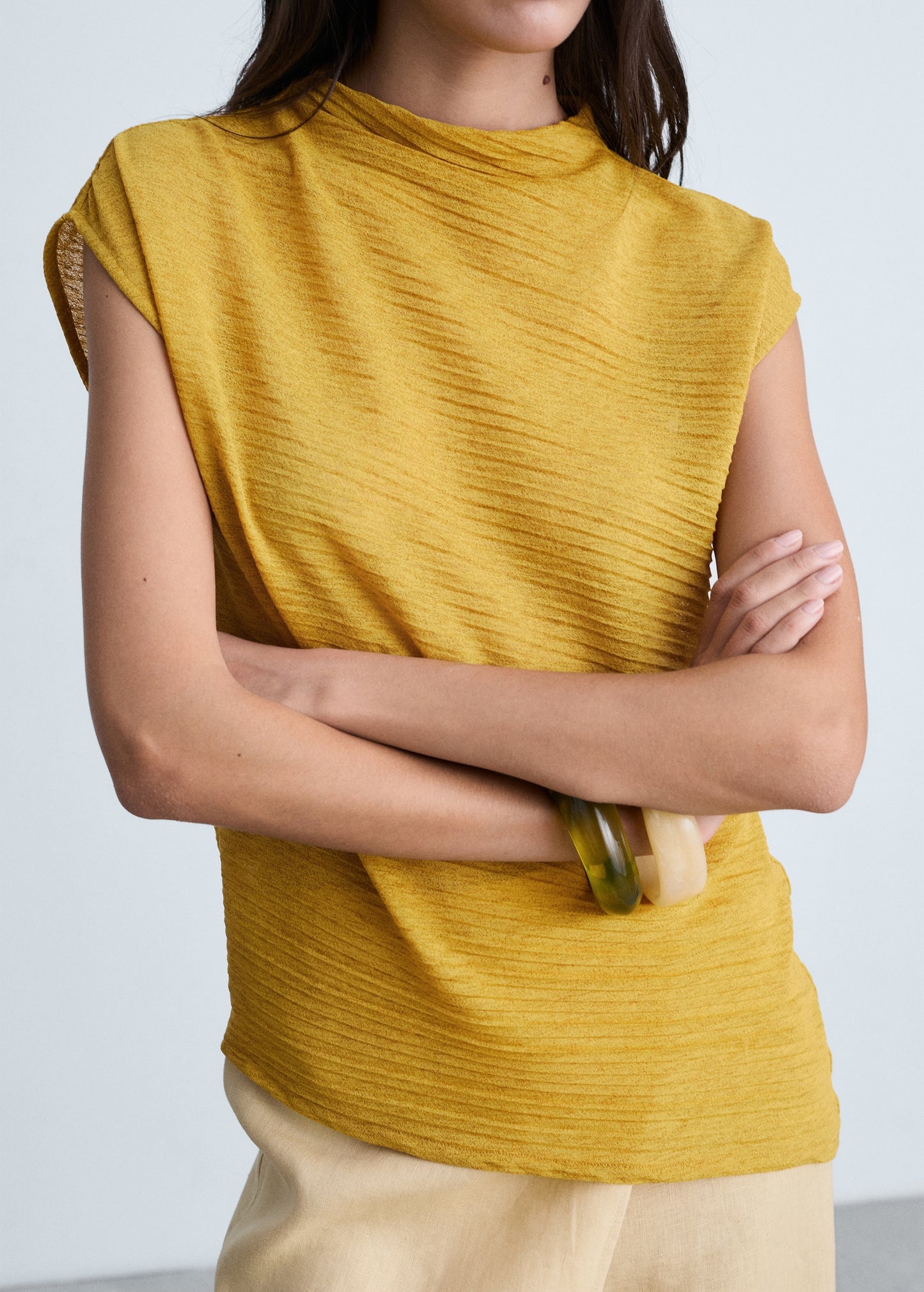 Asymmetrical textured top