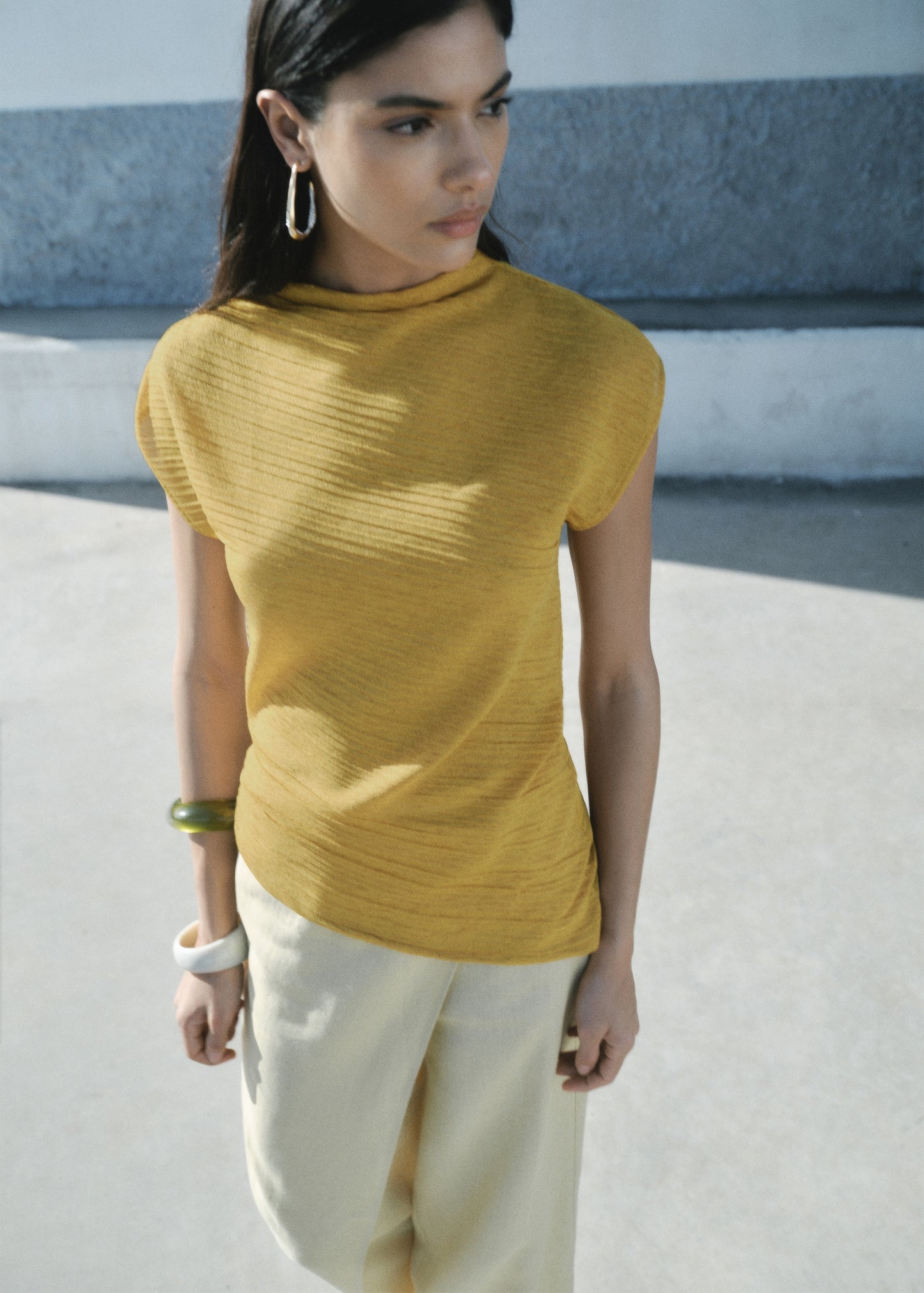 Asymmetrical textured top