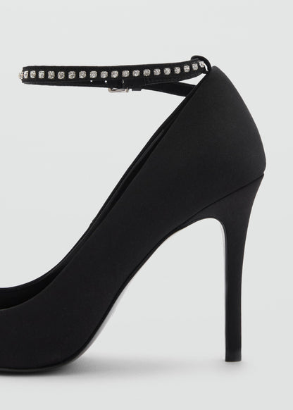 Heeled shoes with rhinestone bracelet