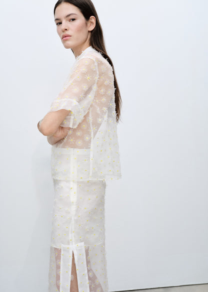 Semi-transparent skirt embroidered with flowers