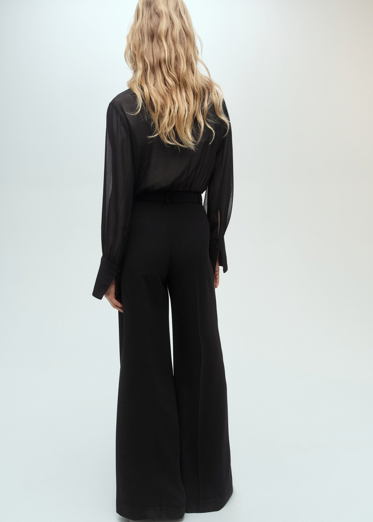 Jumpsuit with semi-transparent sleeves and belt