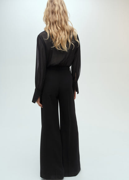 Jumpsuit with semi-transparent sleeves and belt