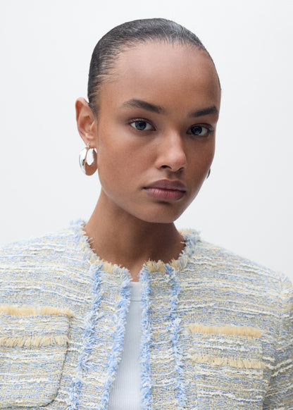 Tweed jacket with frayed ends