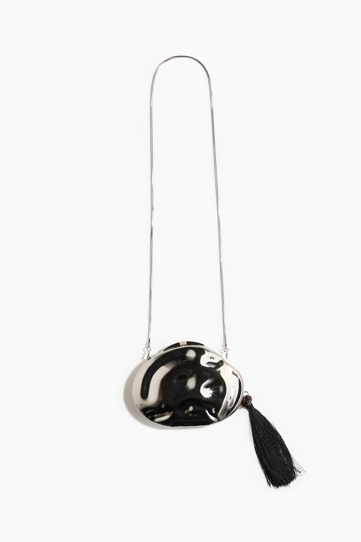 Asymmetric metal clutch