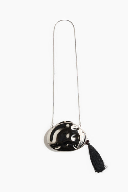 Asymmetric metal clutch