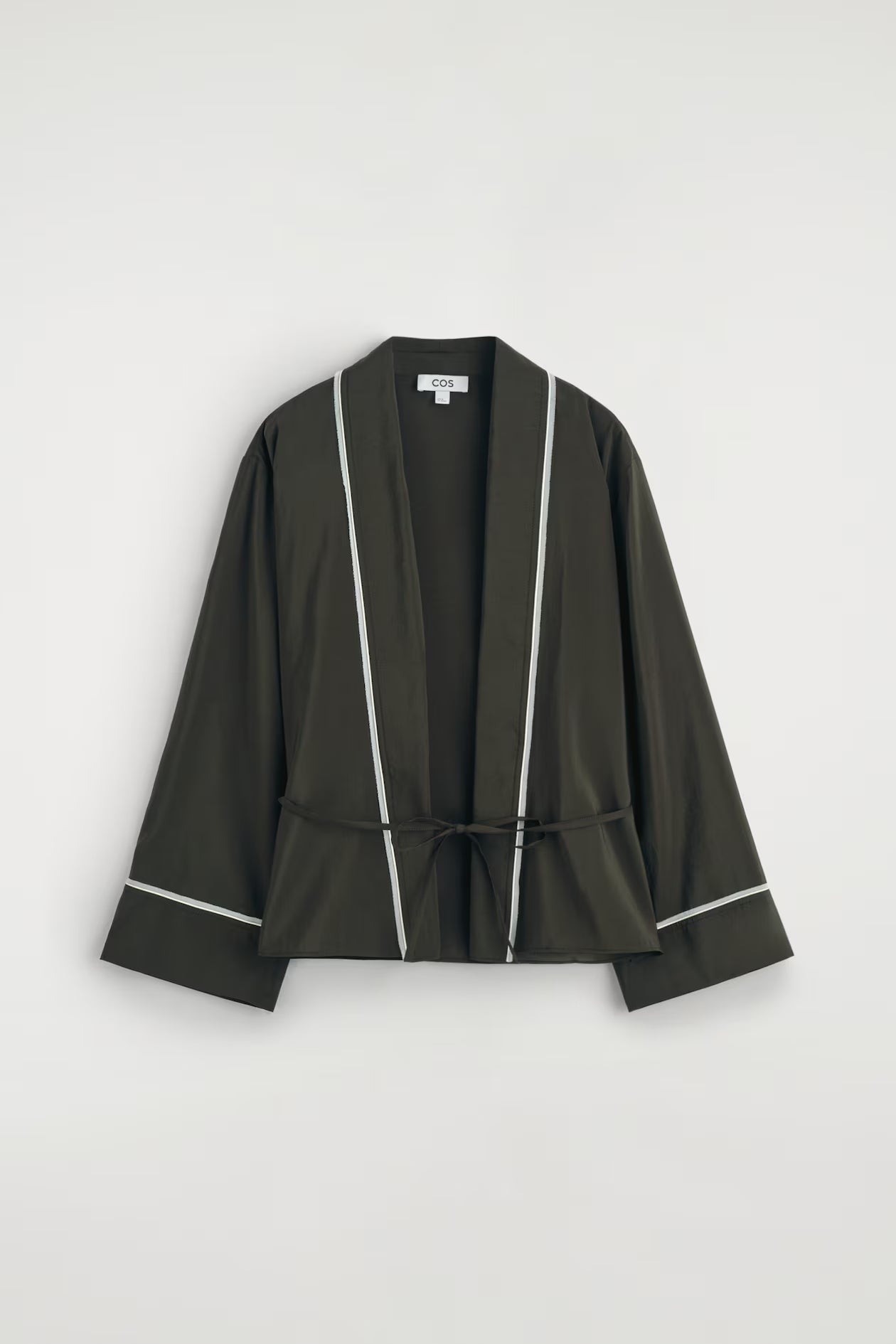 Contrast-piped belted wrap top