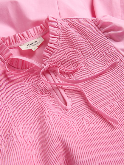 Cotton dress with tie detail