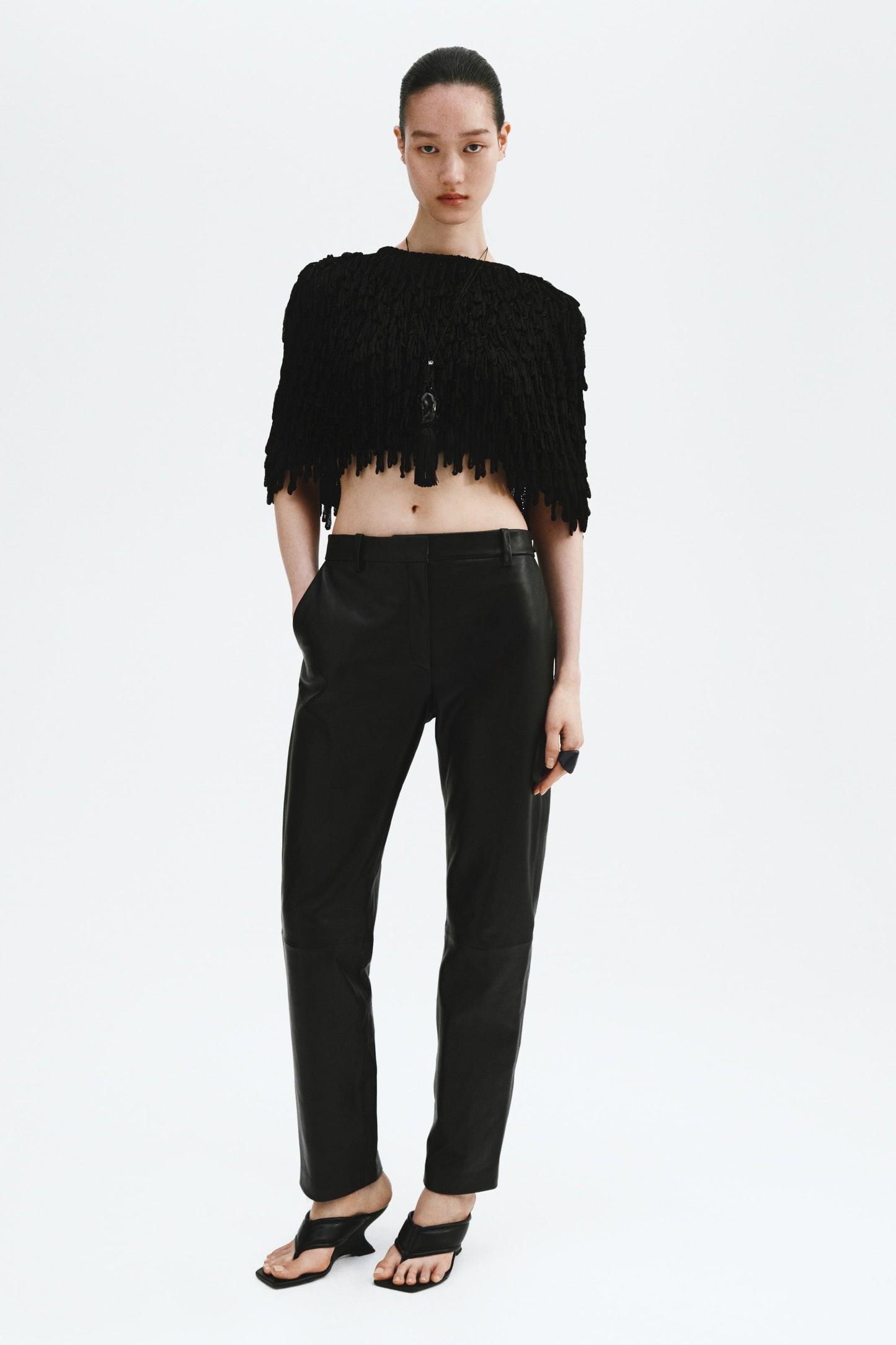 Fringed rib-knit cape
