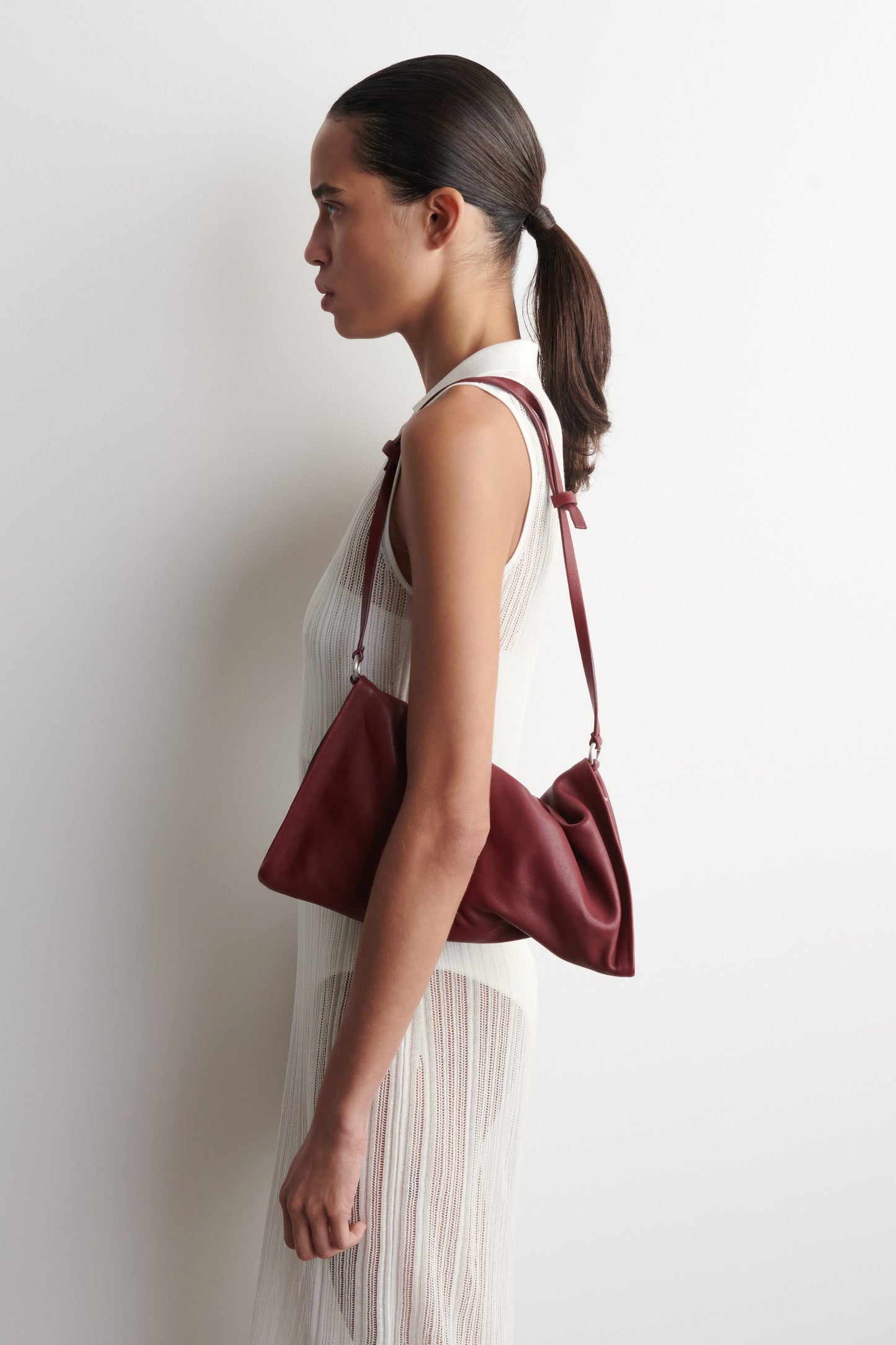 Twisted Leather Mini Clutch Bag