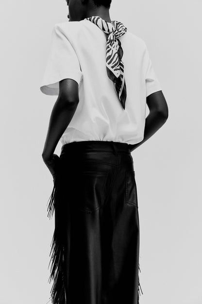 Fringed coated trousers