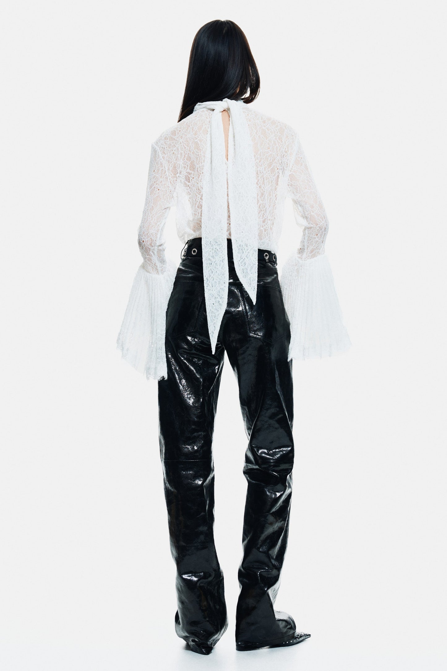 Trumpet-sleeved lace blouse