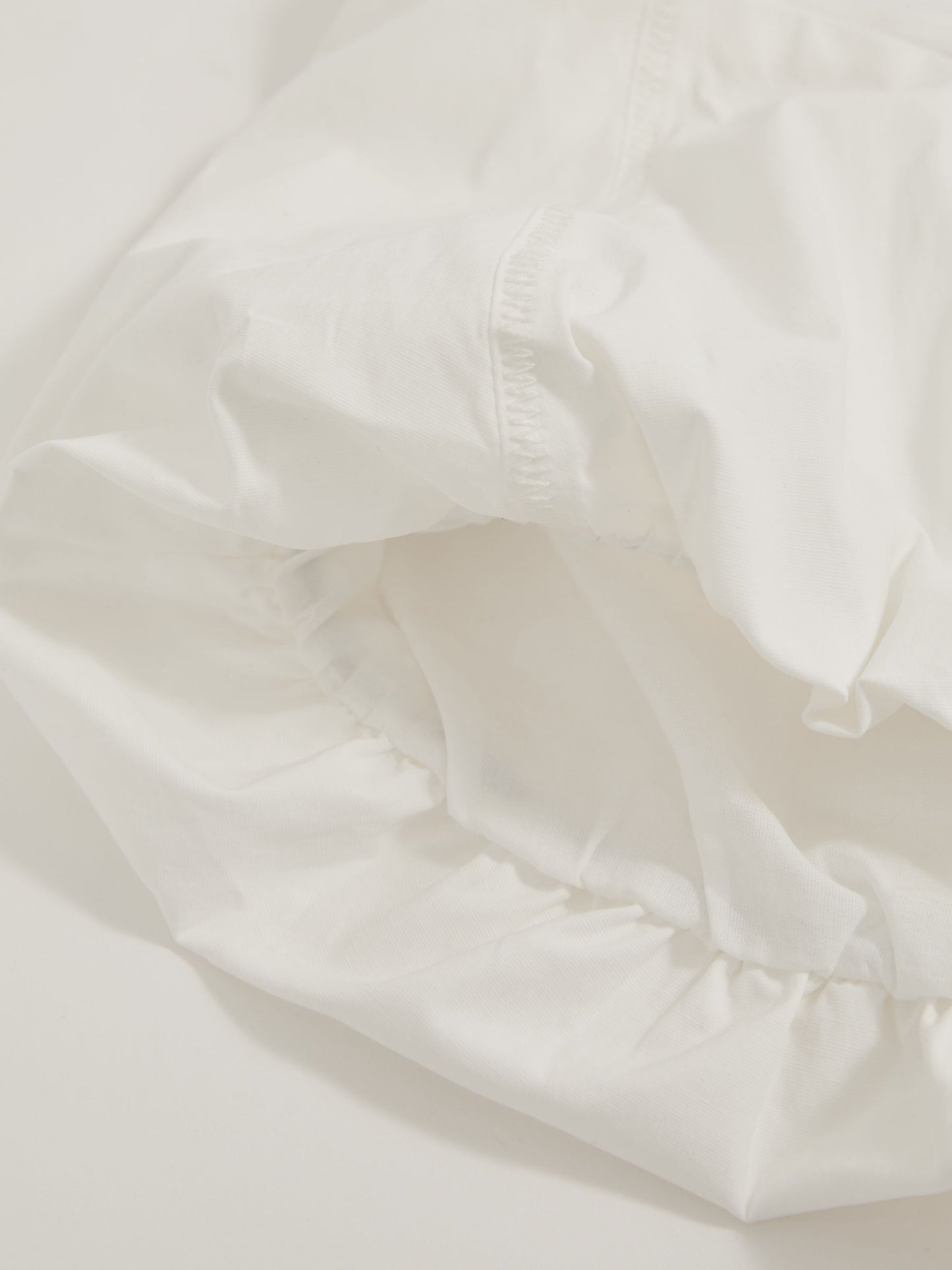 Cotton-Blend Bandeau Puffball Top in Ivory