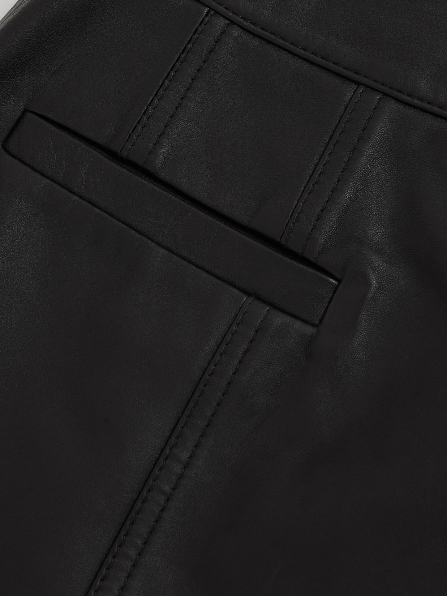 Leather Welt-Pocket Mini Skirt in Black