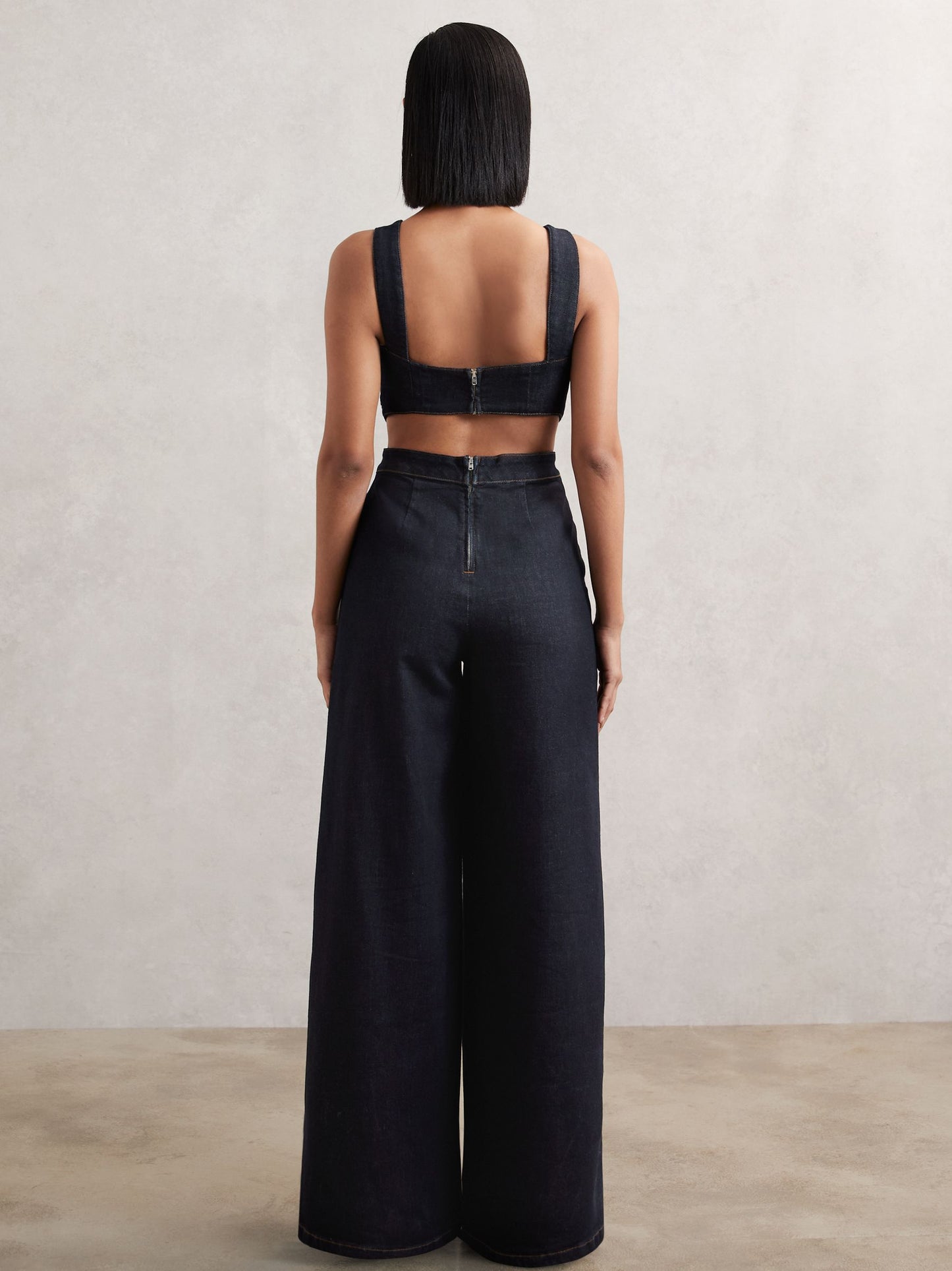 Wide-Leg Cut-Out Denim Jumpsuit in Dark Blue