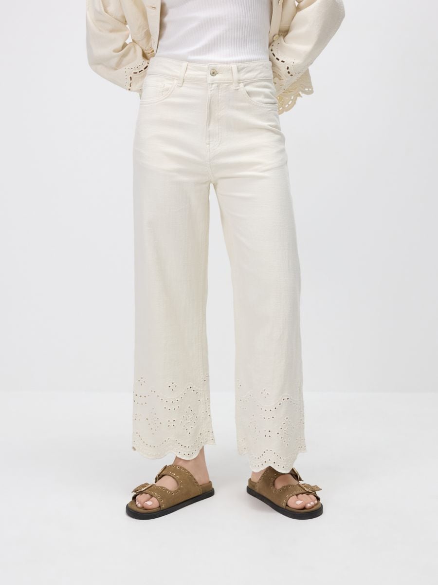 Wide-leg jeans with lace pattern