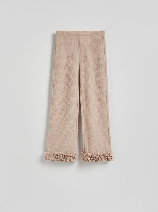 Trousers with ruffle detail